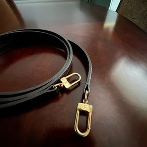 LV brown leather purse strap with LV embossed on hardware